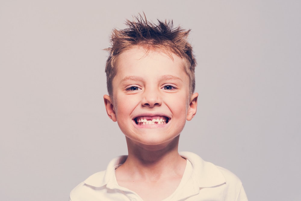 boy lost his deciduous teeth